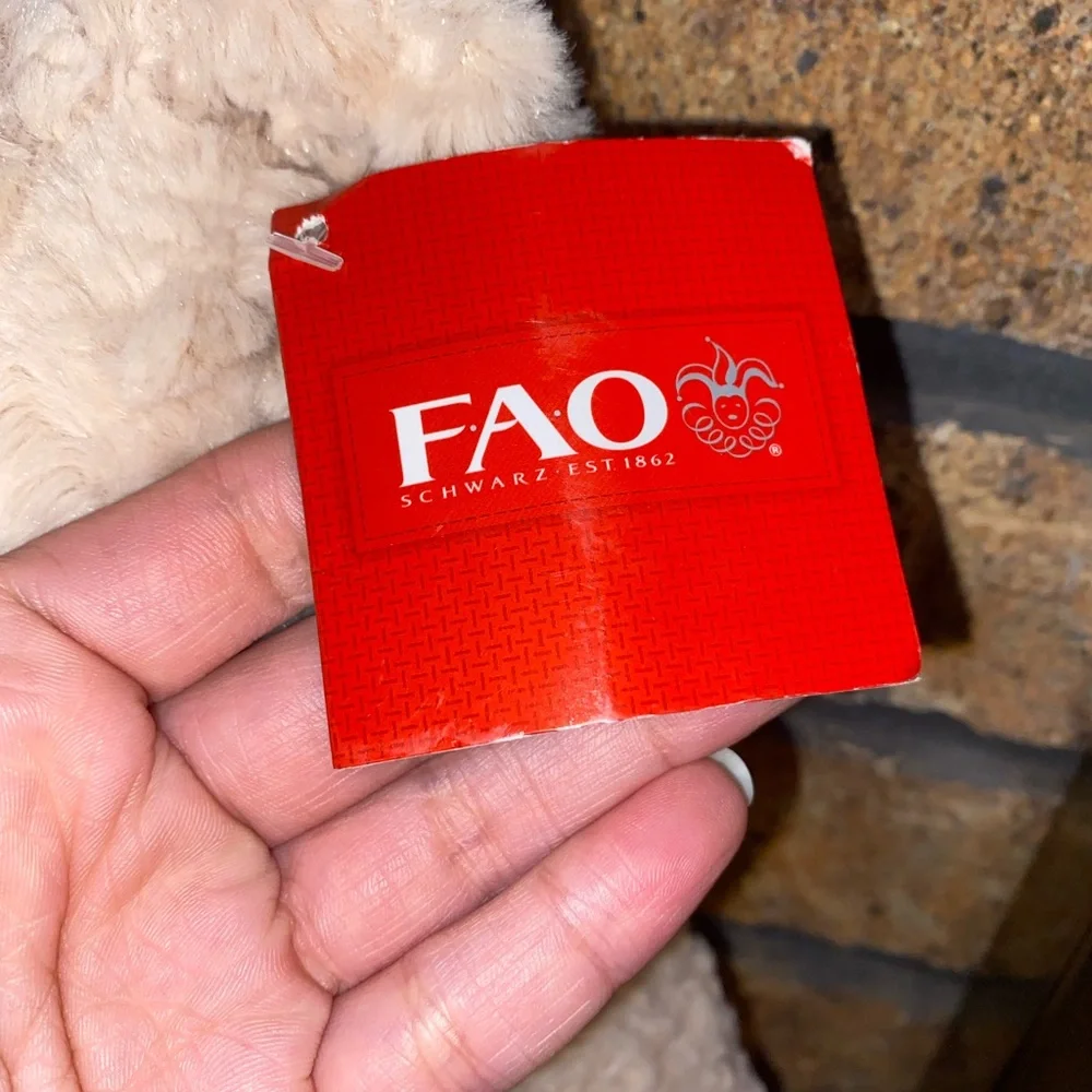 FAO Schwarz bear stuffed animal. 2016 Geoffrey, Purple dress and bow. - Picture 6 of 7